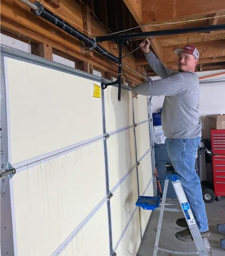 Professional replacement of broken torsion springs ensuring safety and smooth operation for Garage Door Repair in Springville systems.